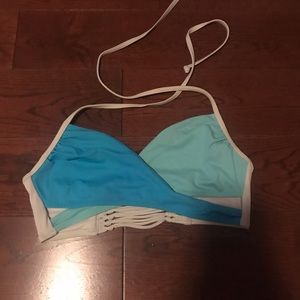 Victoria’s Secret pink cross blue bikini top